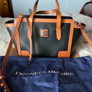 Dooney and Bourke purse. Black w/ Brown/Tan trim. Excellent Shape.